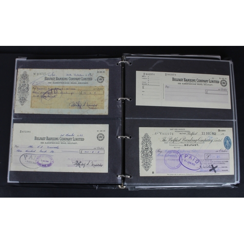 23 - Cheques (219), a collection of Belfast Banking Company cheques in an album, date range 1830 - 1970, ... 