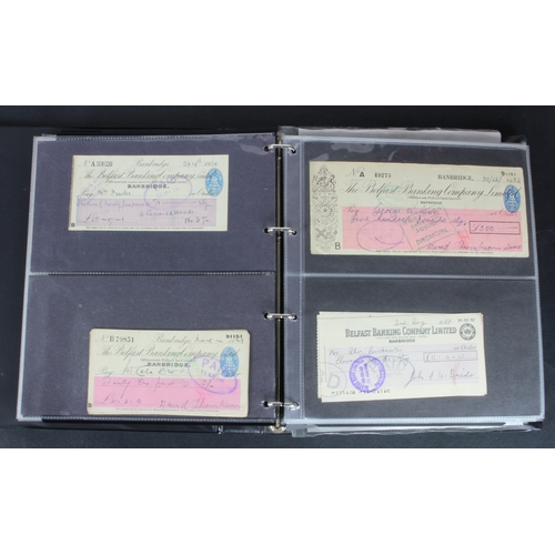 23 - Cheques (219), a collection of Belfast Banking Company cheques in an album, date range 1830 - 1970, ... 