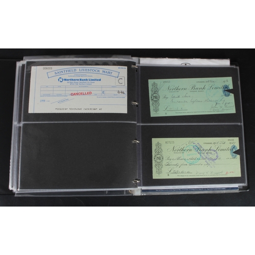 25 - Cheques (253), a collection of mainly Northern Bank of Ireland cheques in an album, date range 1930 ... 