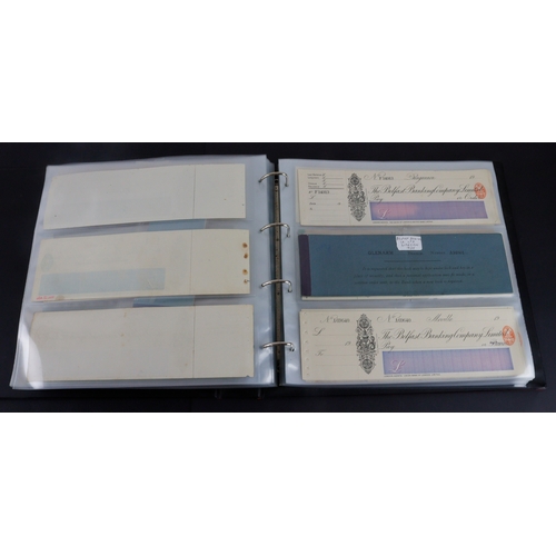 26 - Cheques (262+), a collection of large older cheques in album sorted into Countries of issue, the maj... 