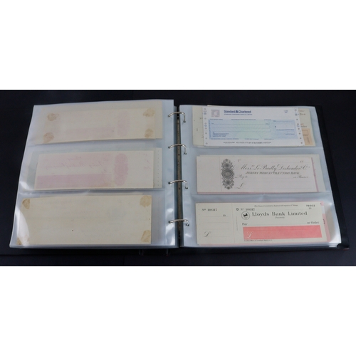 26 - Cheques (262+), a collection of large older cheques in album sorted into Countries of issue, the maj... 