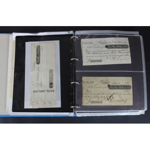 27 - Cheques (264), a collection of mainly Irish cheques in an album, the majority being Bank of Ireland ... 