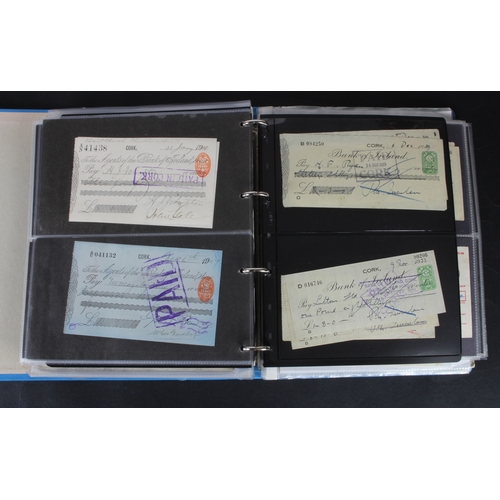 27 - Cheques (264), a collection of mainly Irish cheques in an album, the majority being Bank of Ireland ... 