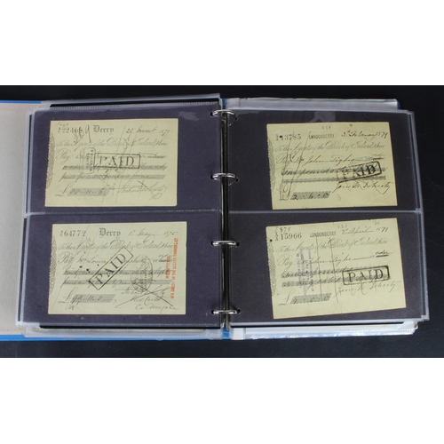 27 - Cheques (264), a collection of mainly Irish cheques in an album, the majority being Bank of Ireland ... 
