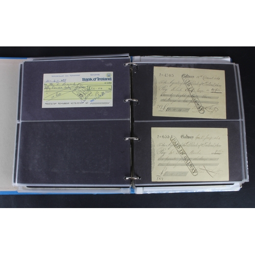 27 - Cheques (264), a collection of mainly Irish cheques in an album, the majority being Bank of Ireland ... 