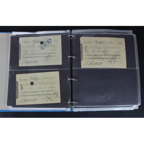 27 - Cheques (264), a collection of mainly Irish cheques in an album, the majority being Bank of Ireland ... 