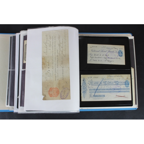 27 - Cheques (264), a collection of mainly Irish cheques in an album, the majority being Bank of Ireland ... 