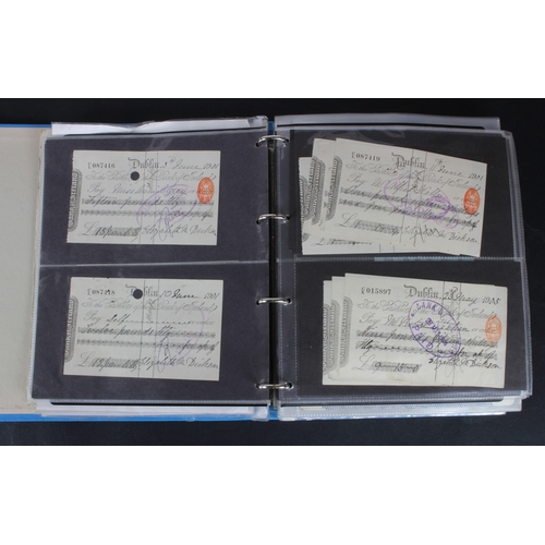 27 - Cheques (264), a collection of mainly Irish cheques in an album, the majority being Bank of Ireland ... 