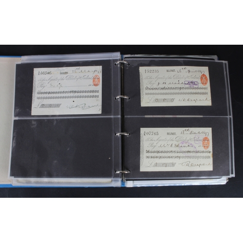 27 - Cheques (264), a collection of mainly Irish cheques in an album, the majority being Bank of Ireland ... 
