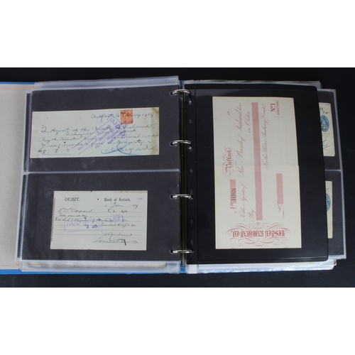27 - Cheques (264), a collection of mainly Irish cheques in an album, the majority being Bank of Ireland ... 