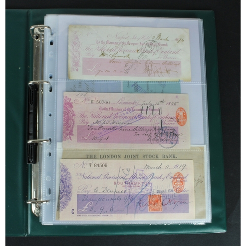 29 - Cheques (64), a collection of mainly British cheques in an album, date range 1832 - 1998, including ... 