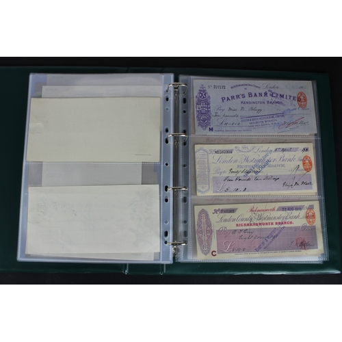 29 - Cheques (64), a collection of mainly British cheques in an album, date range 1832 - 1998, including ... 