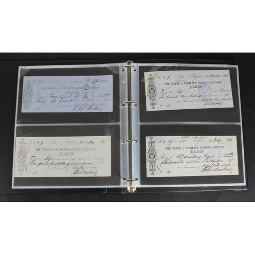 30 - Cheques (73), a collection of Scottish cheques in an album, comprising Aberdeen Town & County Bankin... 