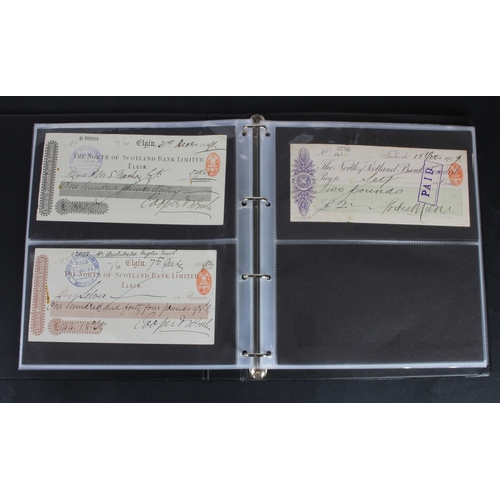 30 - Cheques (73), a collection of Scottish cheques in an album, comprising Aberdeen Town & County Bankin... 