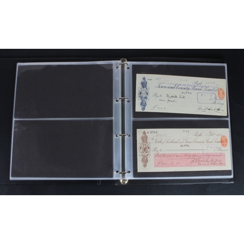 30 - Cheques (73), a collection of Scottish cheques in an album, comprising Aberdeen Town & County Bankin... 