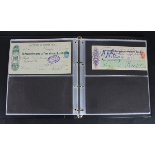 30 - Cheques (73), a collection of Scottish cheques in an album, comprising Aberdeen Town & County Bankin... 