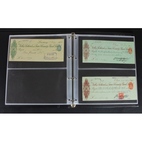 30 - Cheques (73), a collection of Scottish cheques in an album, comprising Aberdeen Town & County Bankin... 