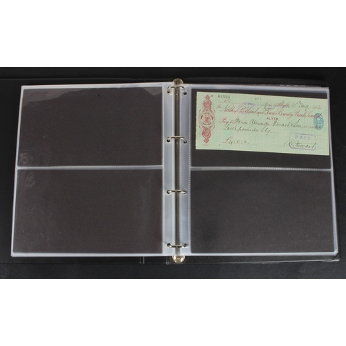 30 - Cheques (73), a collection of Scottish cheques in an album, comprising Aberdeen Town & County Bankin... 
