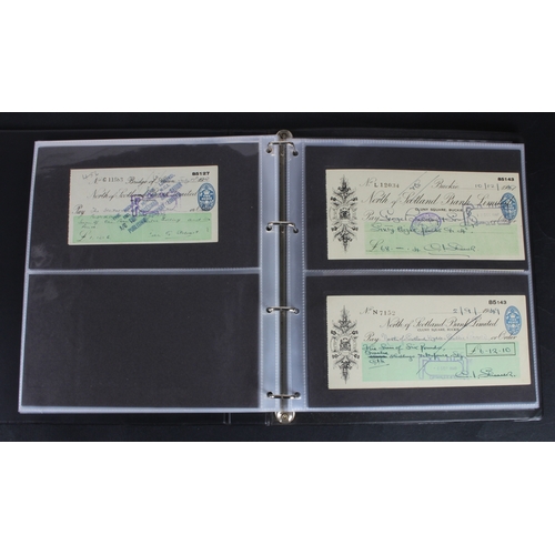 30 - Cheques (73), a collection of Scottish cheques in an album, comprising Aberdeen Town & County Bankin... 