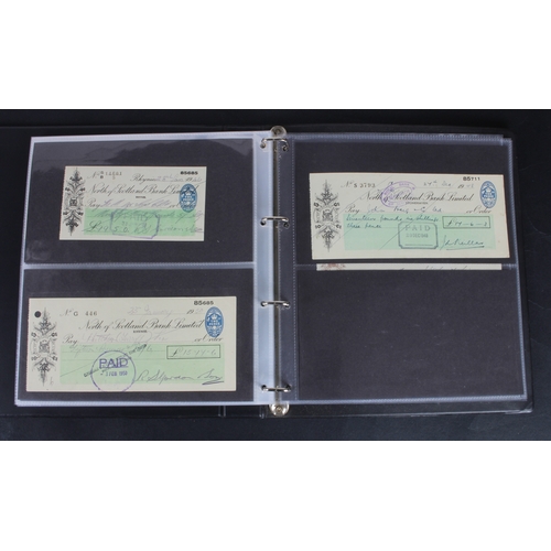 30 - Cheques (73), a collection of Scottish cheques in an album, comprising Aberdeen Town & County Bankin... 