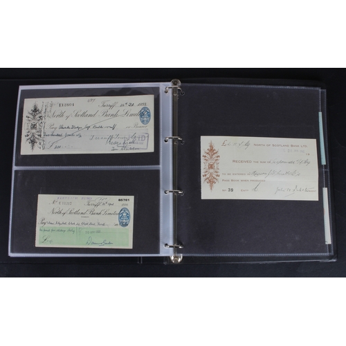 30 - Cheques (73), a collection of Scottish cheques in an album, comprising Aberdeen Town & County Bankin... 