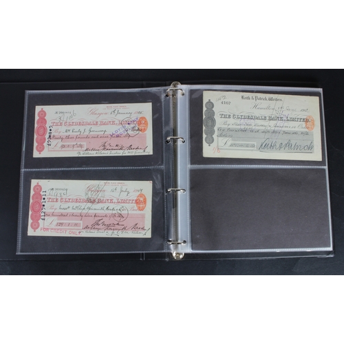 30 - Cheques (73), a collection of Scottish cheques in an album, comprising Aberdeen Town & County Bankin... 