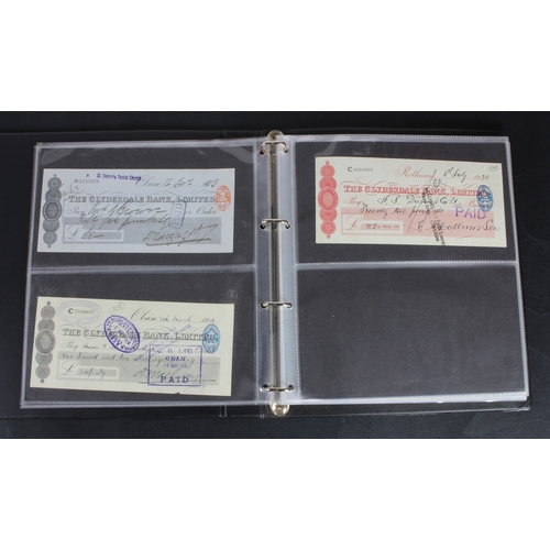 30 - Cheques (73), a collection of Scottish cheques in an album, comprising Aberdeen Town & County Bankin... 