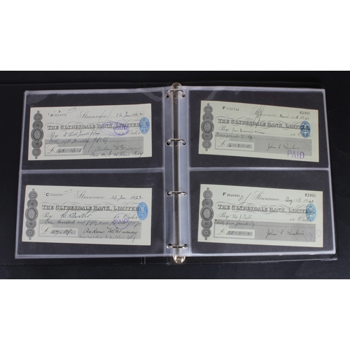 30 - Cheques (73), a collection of Scottish cheques in an album, comprising Aberdeen Town & County Bankin... 