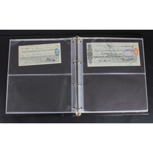 30 - Cheques (73), a collection of Scottish cheques in an album, comprising Aberdeen Town & County Bankin... 