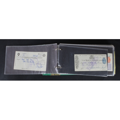 32 - Cheques and receipts (129), a collection of Scottish mainly cheques and receipts in an album, includ... 