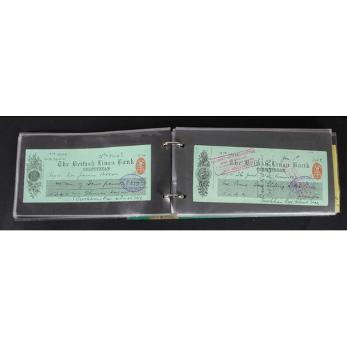 32 - Cheques and receipts (129), a collection of Scottish mainly cheques and receipts in an album, includ... 