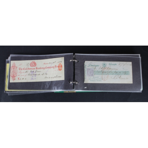 32 - Cheques and receipts (129), a collection of Scottish mainly cheques and receipts in an album, includ... 