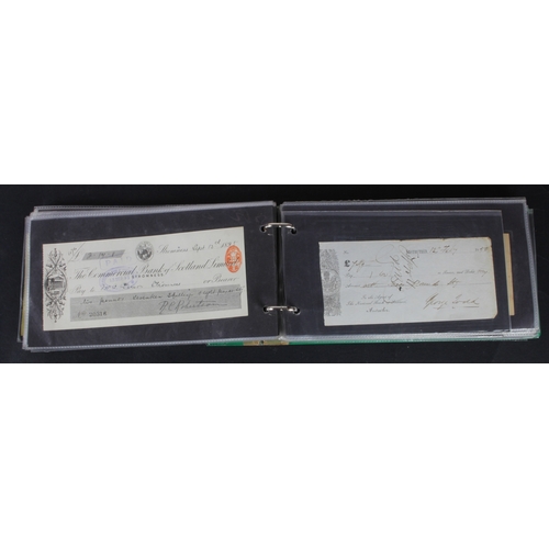 32 - Cheques and receipts (129), a collection of Scottish mainly cheques and receipts in an album, includ... 