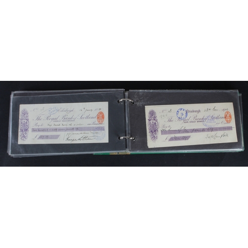 32 - Cheques and receipts (129), a collection of Scottish mainly cheques and receipts in an album, includ... 