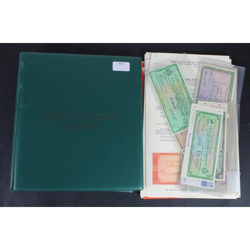 34 - Cheques and Travellers Cheques (107), an album of cheques from the 1800's, 40 British Banks and 50 F... 