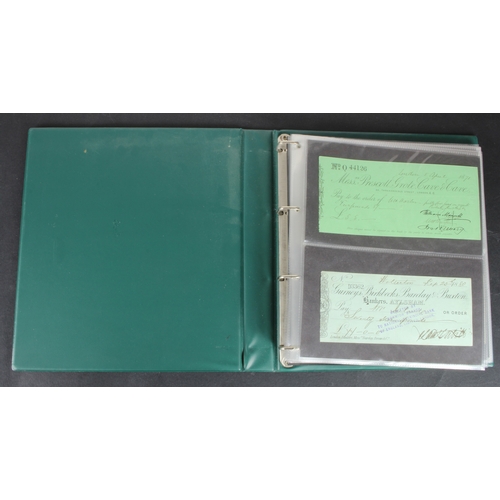 34 - Cheques and Travellers Cheques (107), an album of cheques from the 1800's, 40 British Banks and 50 F... 