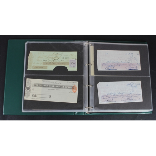 34 - Cheques and Travellers Cheques (107), an album of cheques from the 1800's, 40 British Banks and 50 F... 