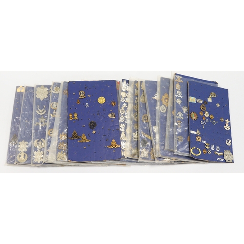 1065 - Cap badges - ex dealers stock mounted on cards, also includes collars / shoulder titles, etc  (appro... 