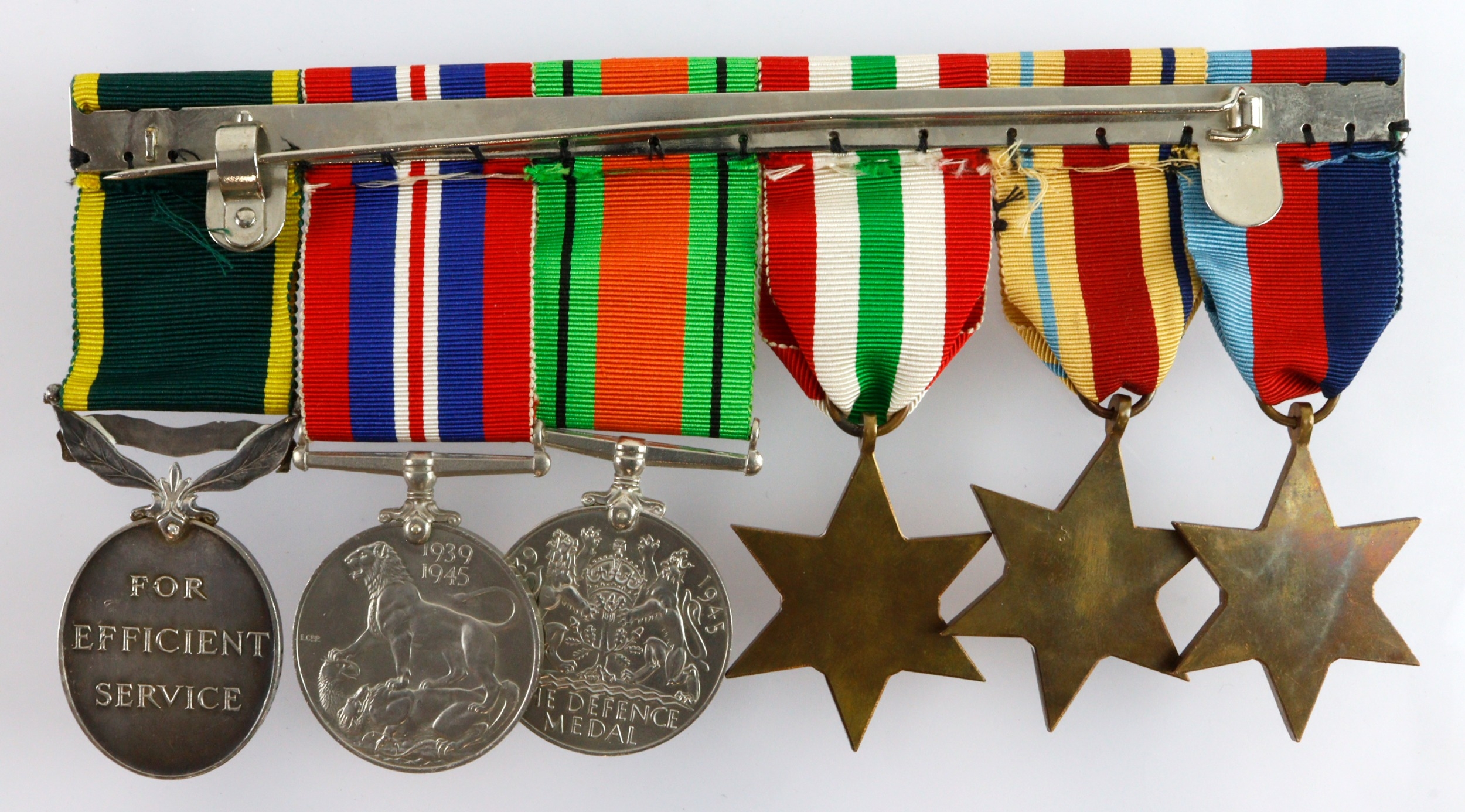 Group mounted as worn - 1939-45 Star, Africa Star + 8th Army clasp ...