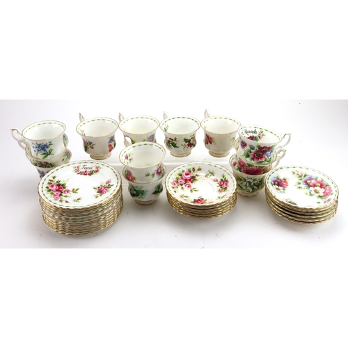 119 - Royal Albert 'Flower of the Month Series' tea set, comprising twelve cups, twelve saucers & twelve s... 