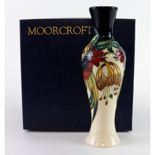63 - Moorcroft 'Anna Lily' pattern vase, dated 1998, makers marks to base, height 20cm approx., contained... 