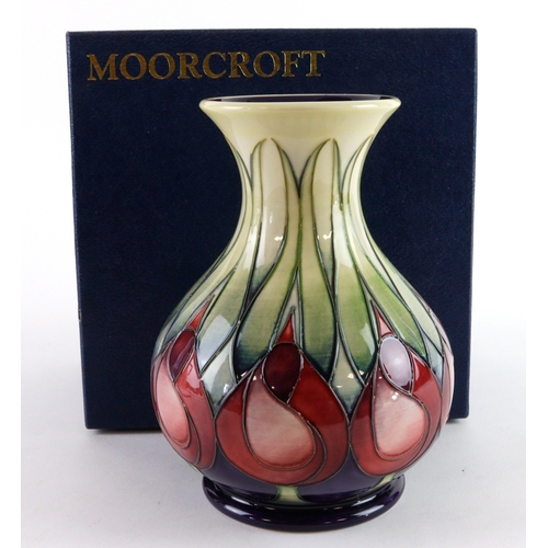 67 - Moorcroft 'April Tulips' pattern vase, dated 2002, makers marks to base, height 15.5cm approx., cont... 