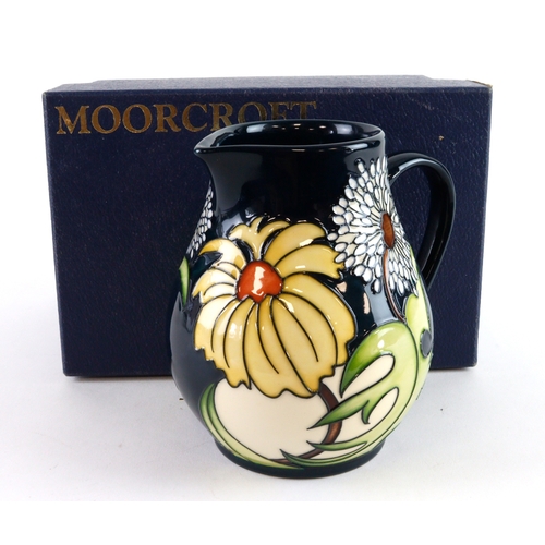74 - Moorcroft 'Daisy May' pattern jug, dated 2008, makers marks to base, height 11.5cm approx., containe... 