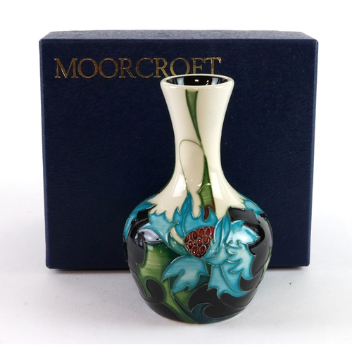 95 - Moorcroft 'Sea Holly' pattern vase, dated 2006, makers marks to base, height 10cm approx., contained... 