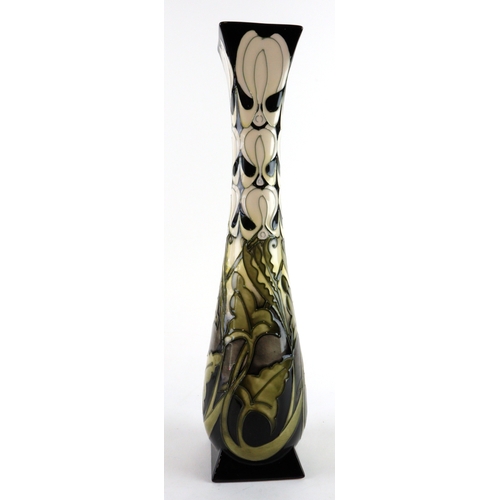97 - Moorcroft slender vase with a square base, dated 2009, makers marks to base, height 35cm approx.