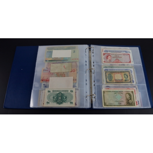 454 - British Commonwealth (90), a good group of Queen Elizabeth II portrait notes in an album, Bahamas (1... 