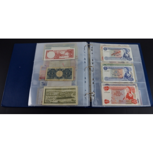 454 - British Commonwealth (90), a good group of Queen Elizabeth II portrait notes in an album, Bahamas (1... 