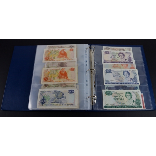 454 - British Commonwealth (90), a good group of Queen Elizabeth II portrait notes in an album, Bahamas (1... 