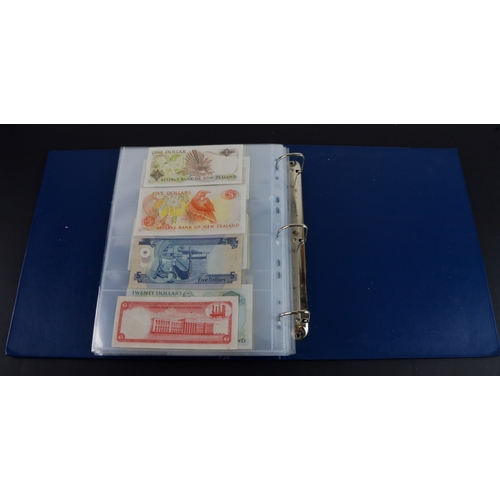 454 - British Commonwealth (90), a good group of Queen Elizabeth II portrait notes in an album, Bahamas (1... 