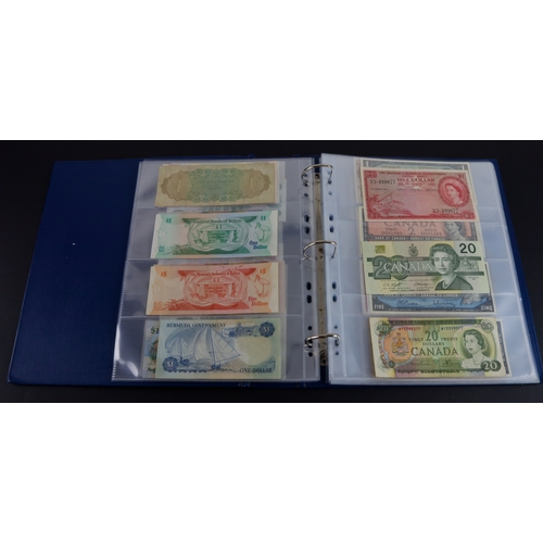 454 - British Commonwealth (90), a good group of Queen Elizabeth II portrait notes in an album, Bahamas (1... 